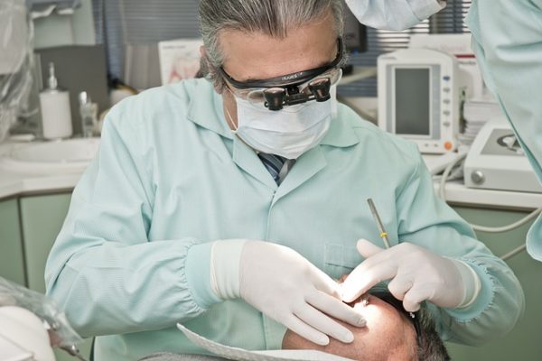 dentist doing dental check-up